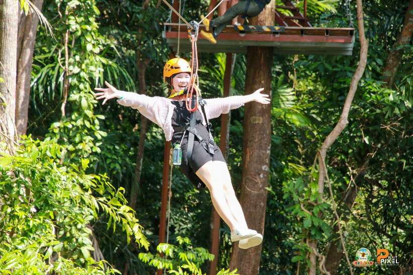 Phuket: Erawan Zipline Adventure with Ocean Views in Patong - Walking through the tropical forest to the first platform