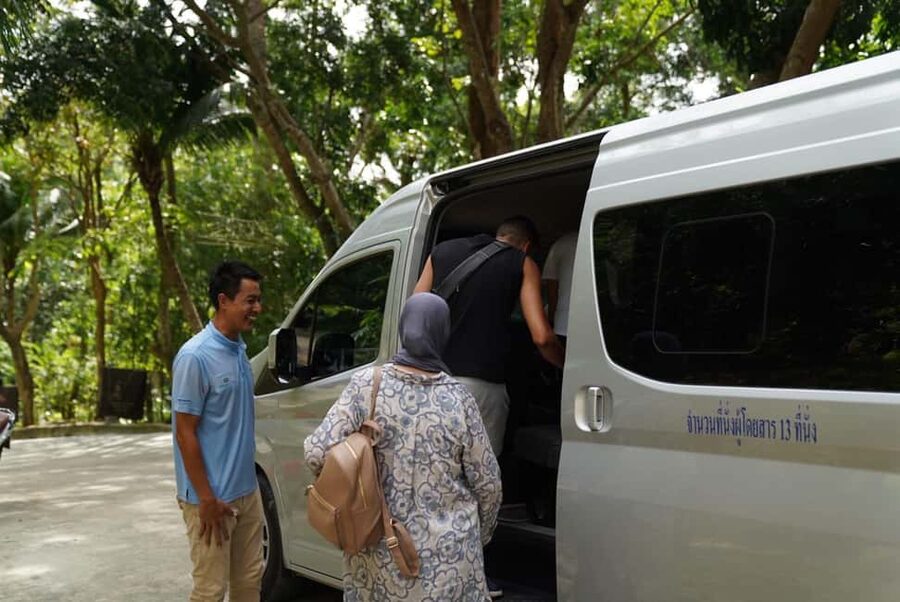 Phuket : Guided Tour to Elephant Sanctuary with Transfers - Walking through the jungle beside the herd