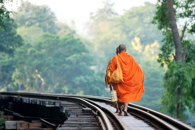 Private Tour: Thai–Burma Death Railway Bridge on the River Kwai from Bangkok - Approaching the bridge by long-tail boat
