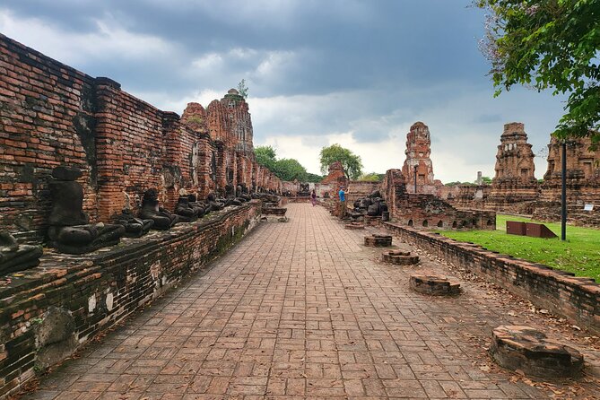 Private tour to Ayutthaya and Boat Tour Heritage Site - Wat Mahathat and the Buddha beneath the roots