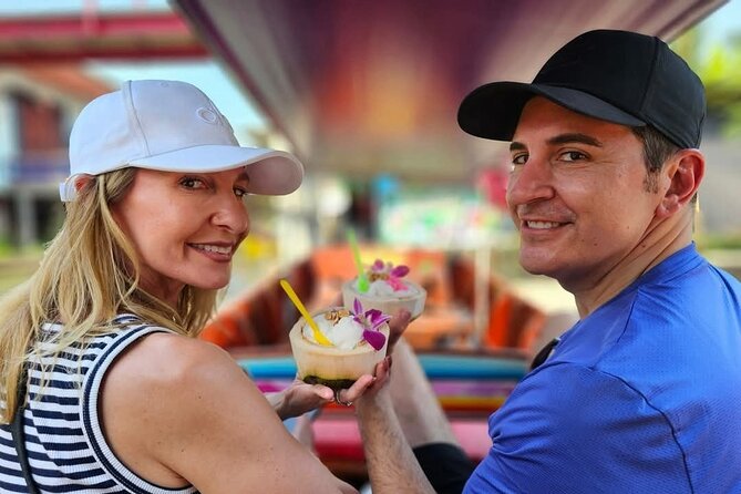 Private Tour to Maeklong Railway Market and Floating Market - A private boat through Damnoen Saduak
