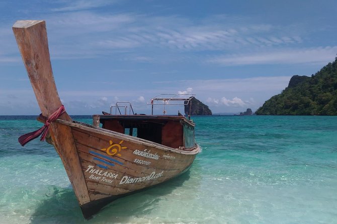 Railay and 4-Island Sunset Speedboat Cruise with Night Snorkel - Tup Island and the sandbanks of the tide