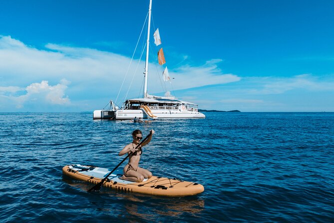 Rhapsody Phuket Coral & Racha Sunset Catamaran Cruise - The long run toward Racha Yai