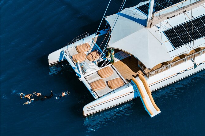 Rhapsody Phuket Coral & Racha Sunset Catamaran Cruise - Water slides, paddleboards, and the floating pool