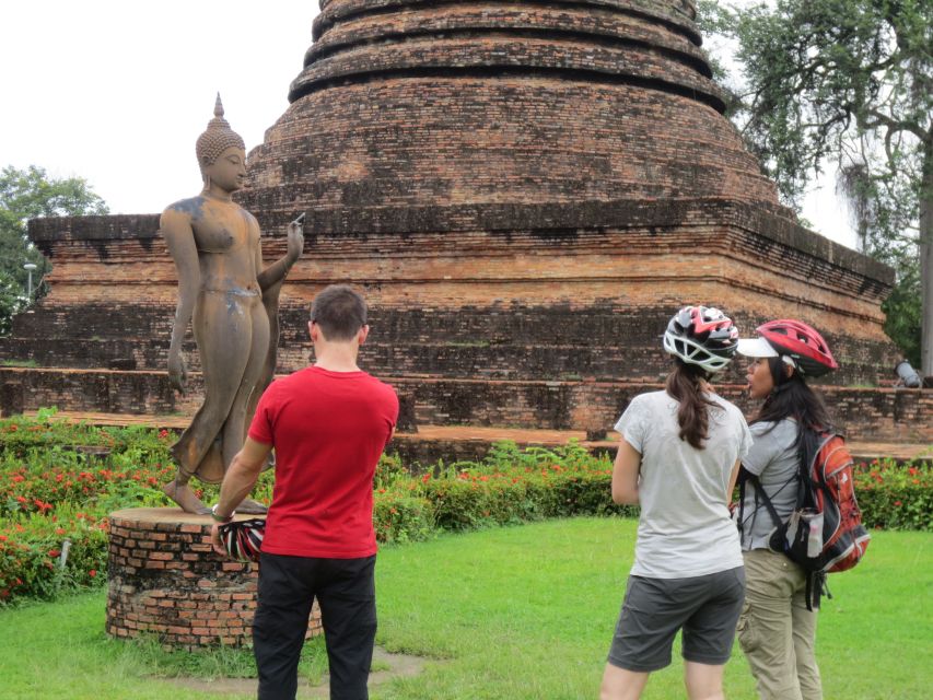 Sukhothai: Historical Park & Countryside Cycling Tour - Entering the Historical Park at the Eastern Gate