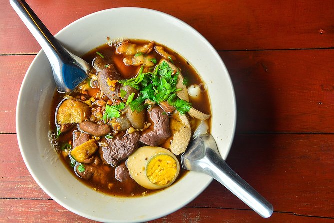 Timeless Thonburi Canal and Food Tour - Boat travel, local public transport, and Wang Lang