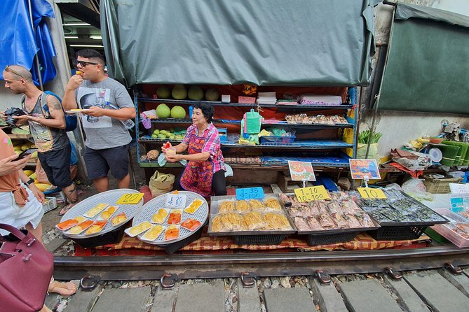 Train & Floating Market Food Adventure + Scenic train ride - From the train to Damnoen Saduak
