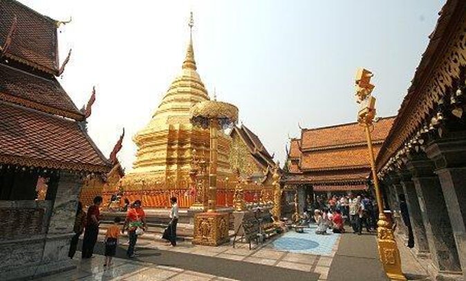 Wat Phra That Doi Suthep spiritual Sunrise Tour with an Ex-monk - The morning alms ceremony